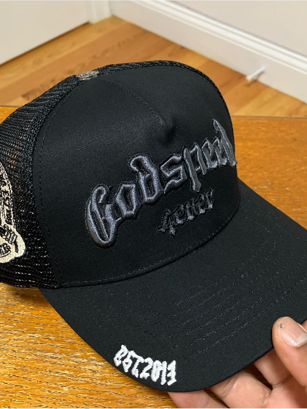 Apex Black Trucker Hat with Embroidered Logo